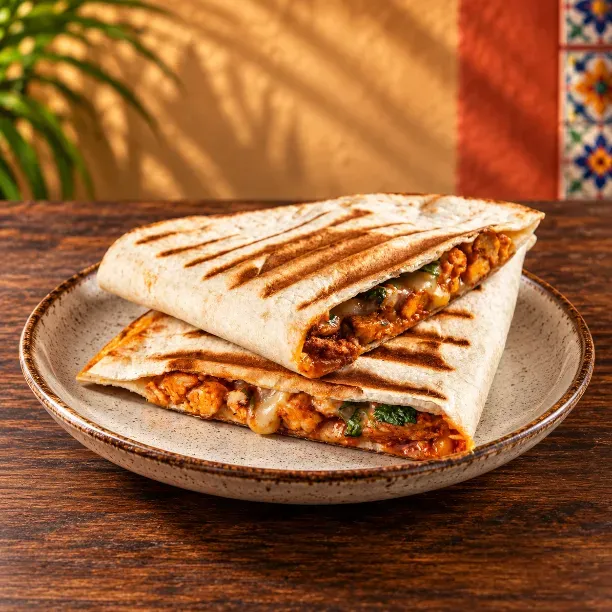 Inside the El Paisano Restaurant at The Carmin kitchen - Freshly prepared American,Beer,Birria,Drinks,Latin American,Mexican for online ordering.