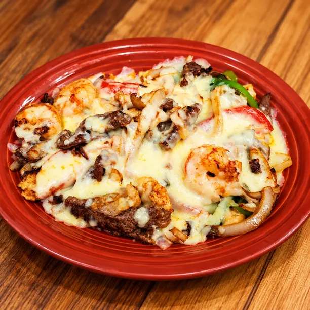 Inside the El Loro Coon Rapids kitchen - Freshly prepared American,Latin American,Mexican for online ordering.