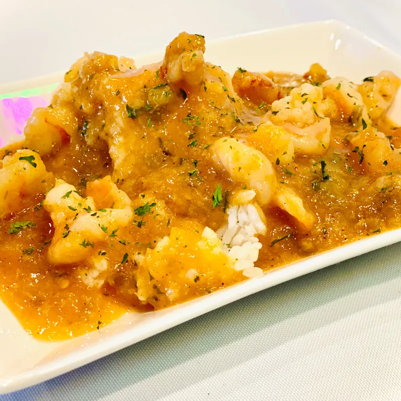 Seafood Etouffee Over Steamed Rice