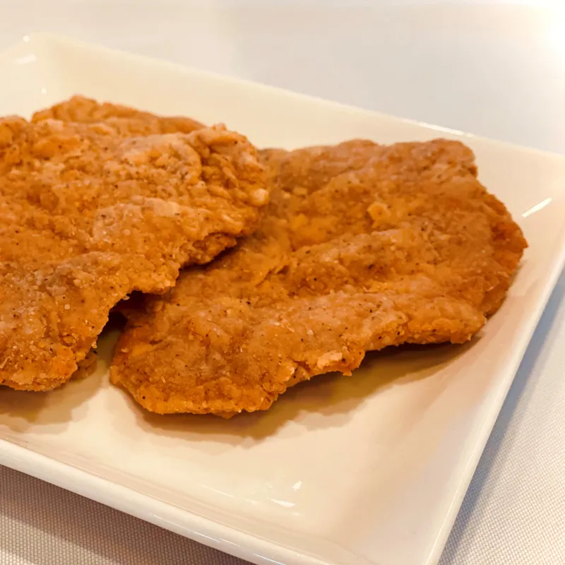 Two Boneless Fried Pork Chops