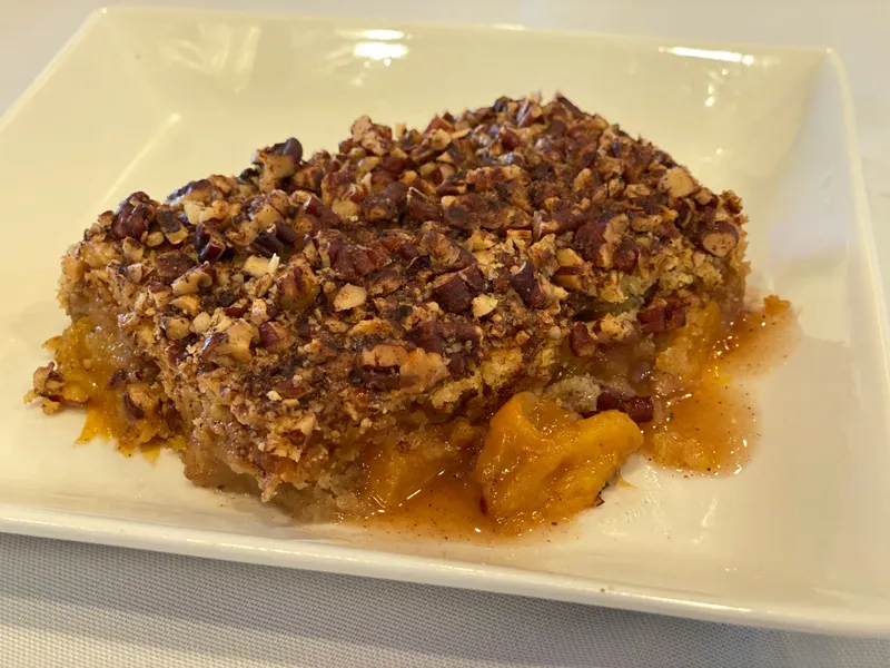 Pecan Peach Cobbler Served With Complimentary Ice Cream