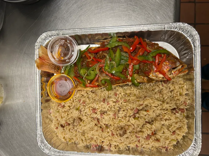 Liberian Dry Rice With Fried Red Snapper Fish