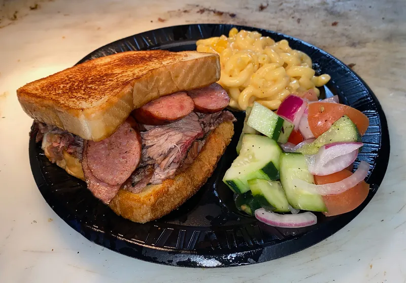 Big Tex Sandwich with 2 Different Meats With 2 Sides