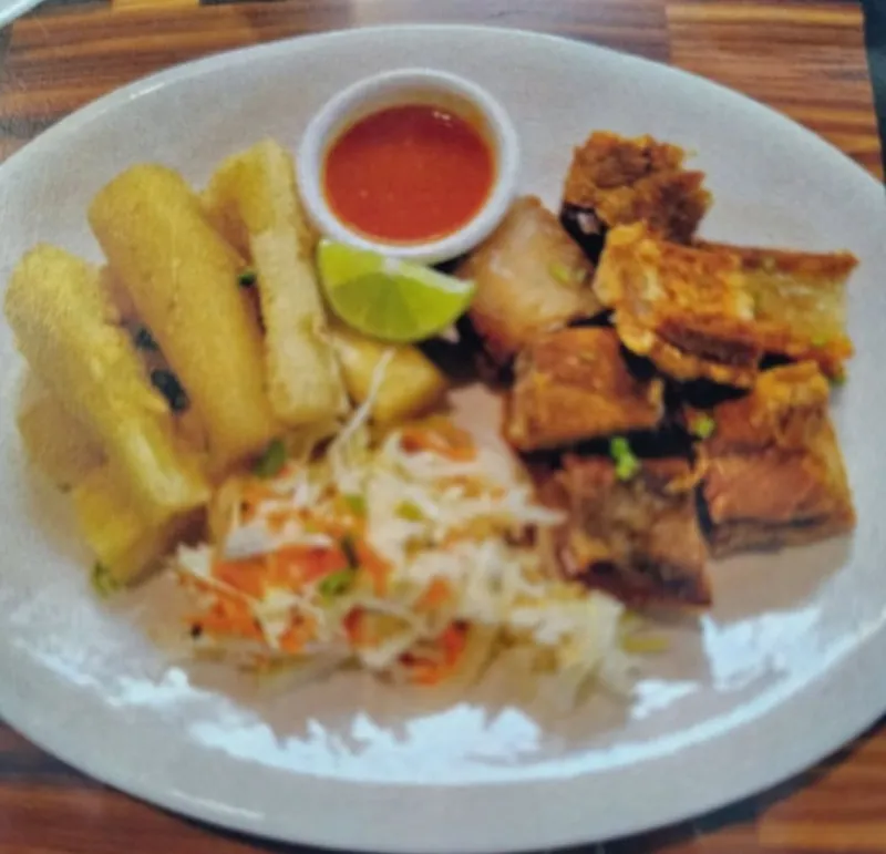 Yuca con Chicharrones/Friend Yuca with pork Rind