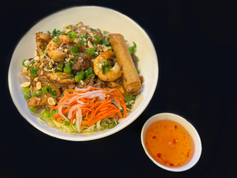 V10. Stir Fried Beef, Chicken, and Shrimp Lemongrass with Eggroll