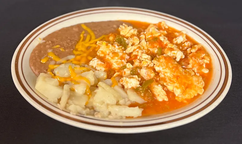 13. Huevos en Salsa