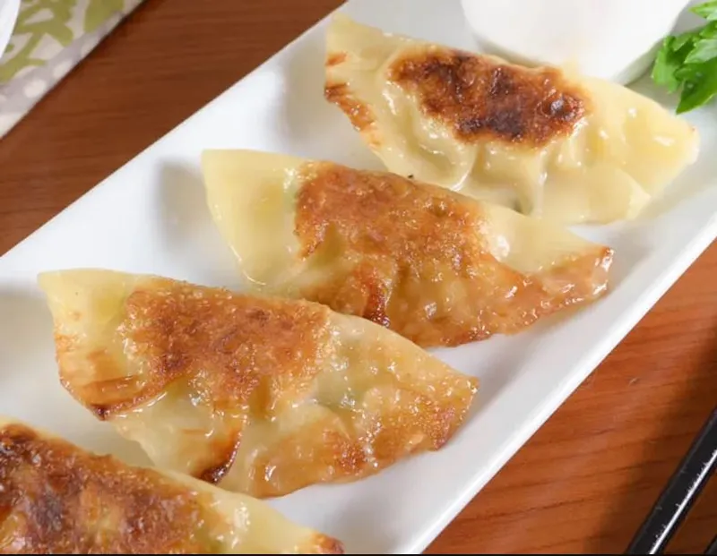 A07. Pot Stickers (6 Pcs)