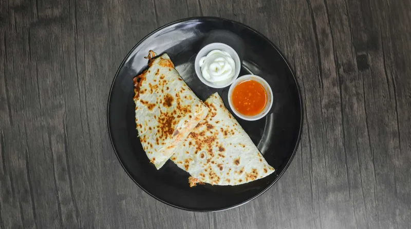 Chicken A La Mexicana Mega Quesadilla Big, Bold & Bursting With Flavor