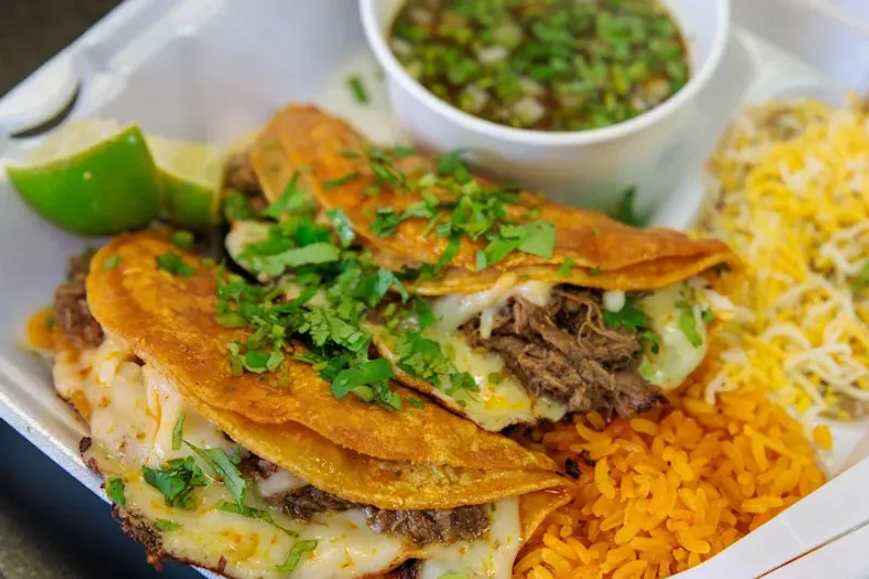 Quesabirria combo - 2 Wet Tacos With Rice And Beans