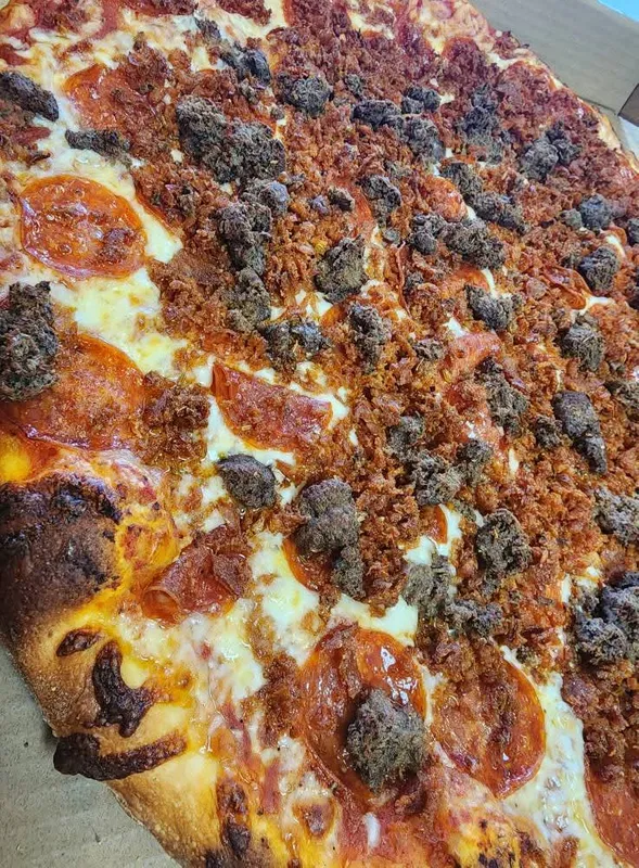 Mad Mad Meat Pizza Slice