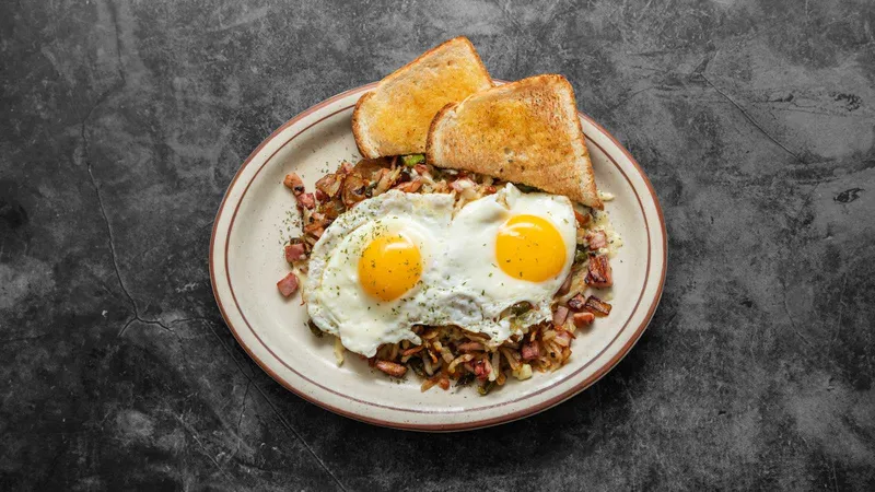 Two Eggs Hash Browns And Toast