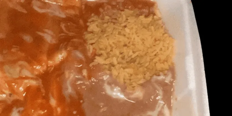 48. 1 Beef Or Chicken Burrito, With Cheese, Beans And Rice