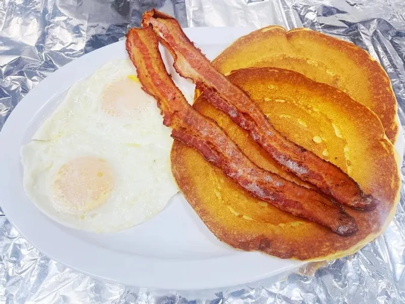 The Two's - 2 Buttermilk Pancakes, 2 Bacon Or Sausage, 2 Eggs