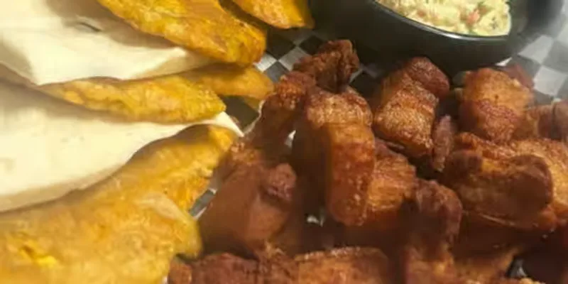 Cochino Frito Con Tostones / Fried Pork With Fried Green Plantains