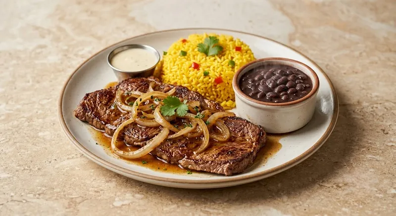 Bistec Encebollado\1 Acompanante