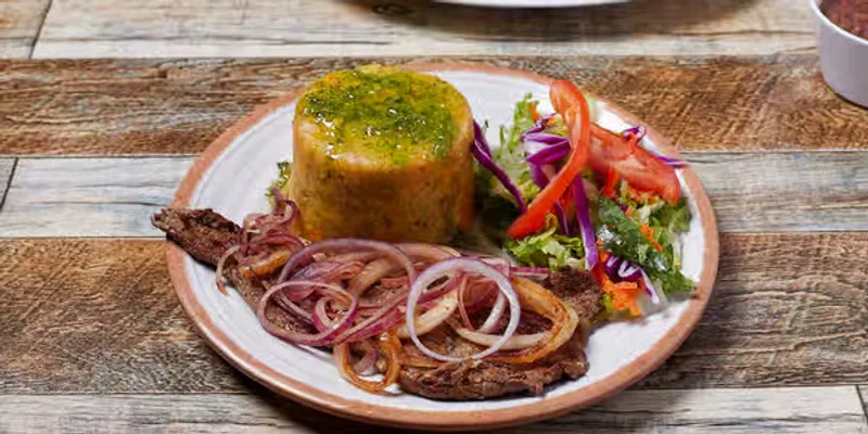 Mf Bistec Encebollado