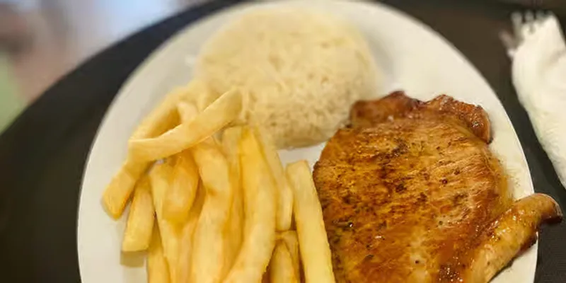 Chuleta, Arroz Y Papas Fritas