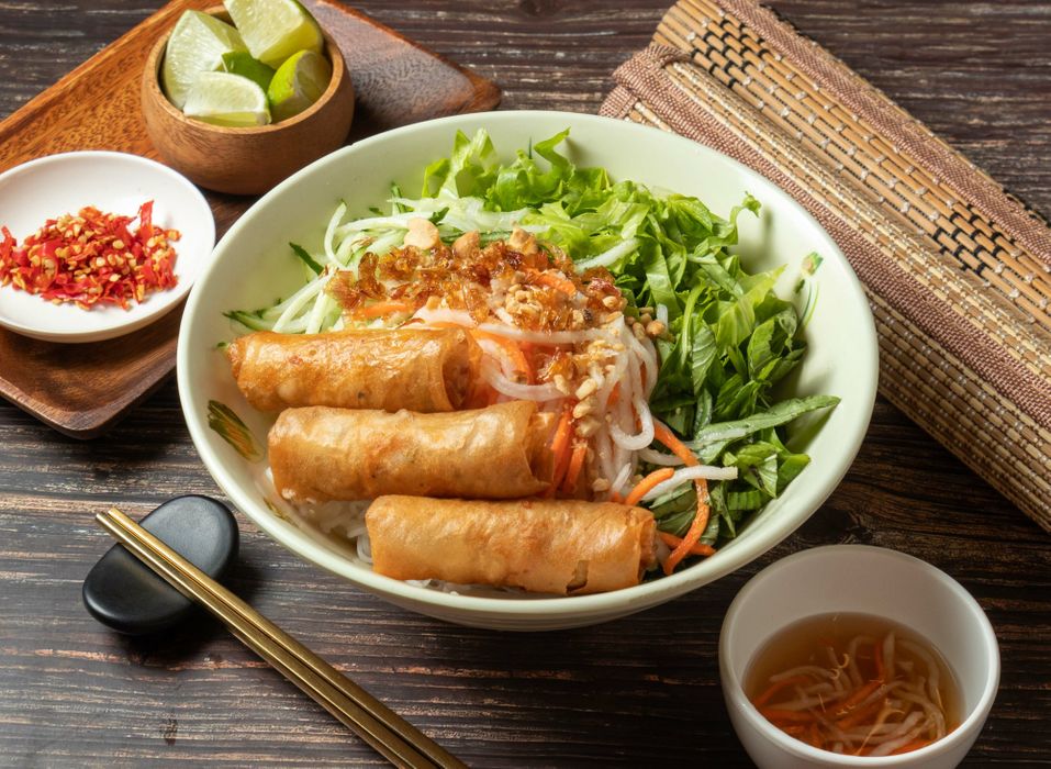Our kitchen team preparing fresh dishes at Best Taste of Pho Saigon - Demo