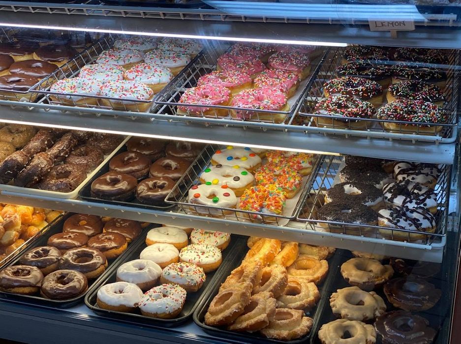 Our kitchen team preparing fresh dishes at Cafe Donuts & Ice Cream - Demo