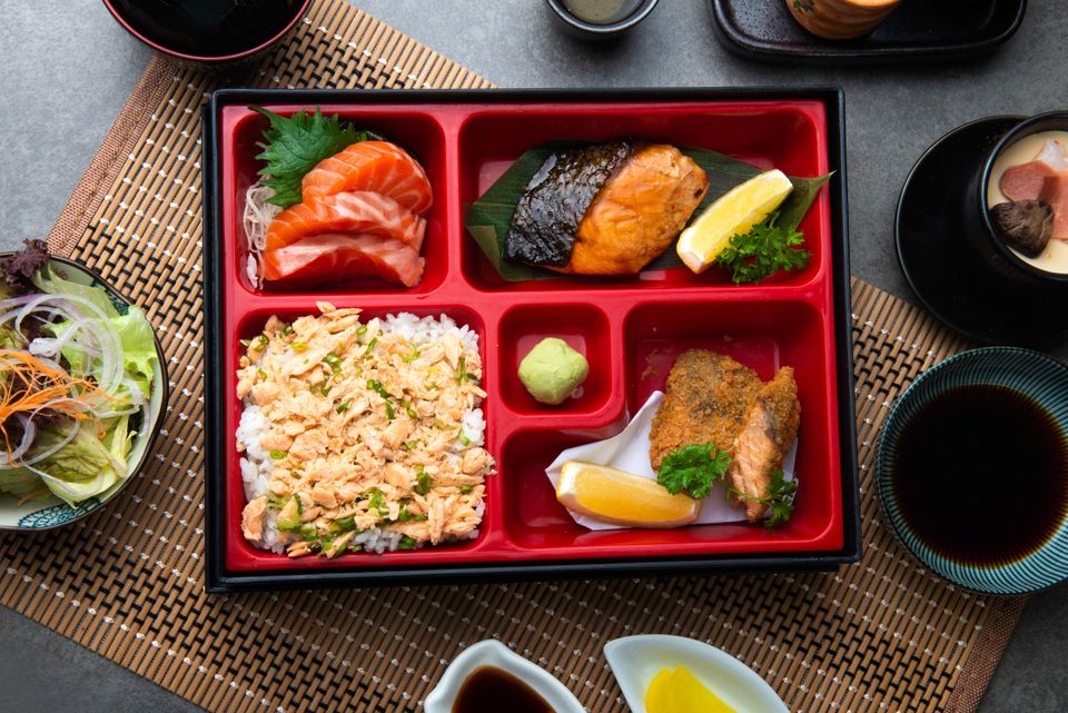 Our kitchen team preparing fresh dishes at Cbowls poke