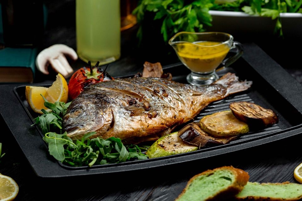 Our kitchen team preparing fresh dishes at Solo BBQ & Seafood, LLC