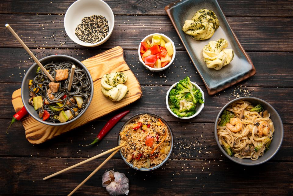 Our kitchen team preparing fresh dishes at Basil Thai