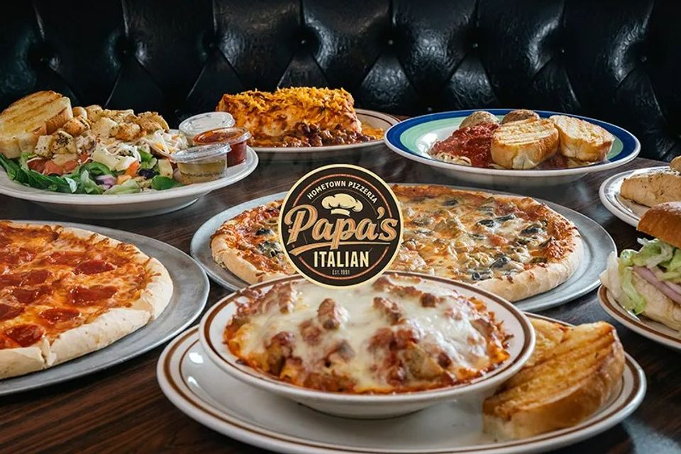 Our kitchen team preparing fresh dishes at Papa's Italian - Demo