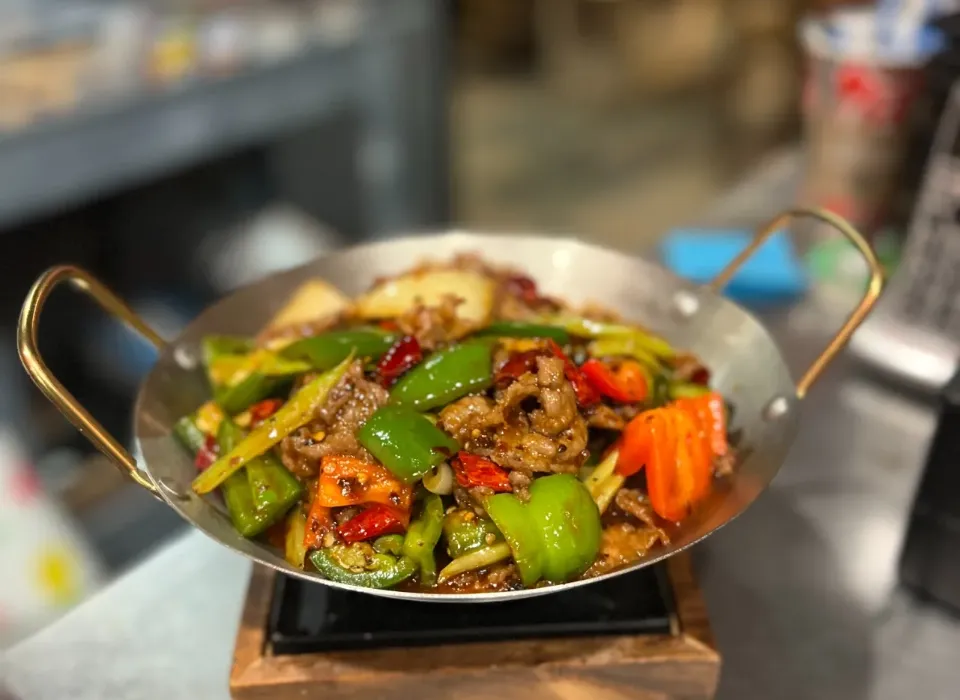 Our kitchen team preparing fresh dishes at Tea House - Demo