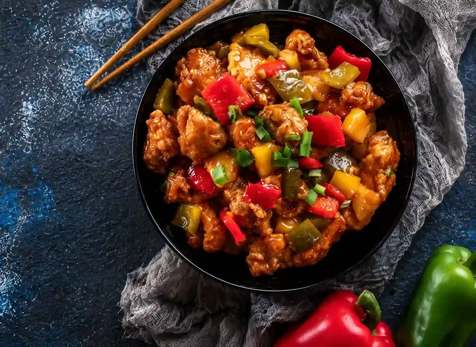 Our kitchen team preparing fresh dishes at A Chau Restaurant - Demo