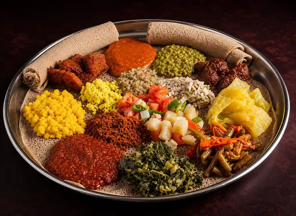 Our kitchen team preparing fresh dishes at Addis Abeba Ethiopian Restaurant - Demo