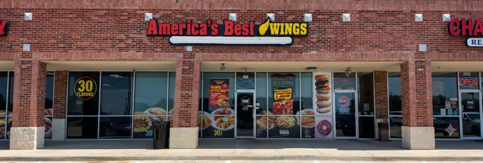 Our kitchen team preparing fresh dishes at America's Best Wings - Demo