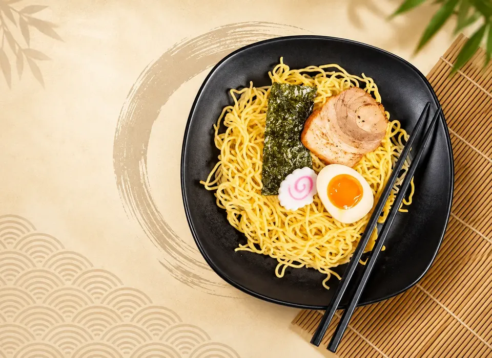Our kitchen team preparing fresh dishes at Ishita Ramen - Demo