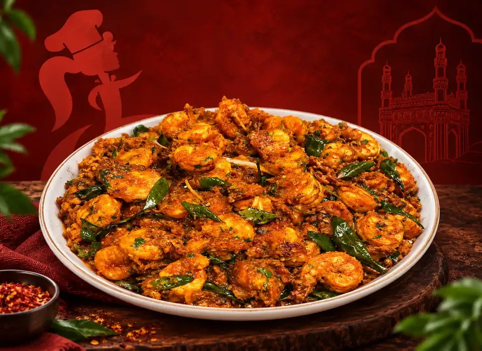 Our kitchen team preparing fresh dishes at R Biryani Adda