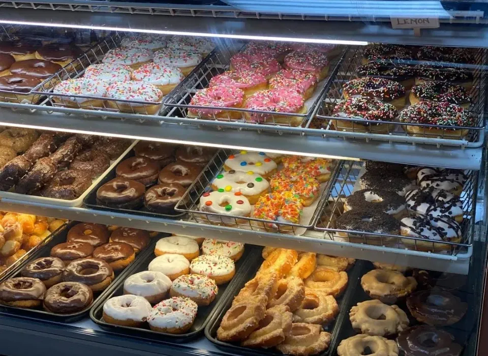Our kitchen team preparing fresh dishes at Cafe Donuts & Ice Cream - Demo