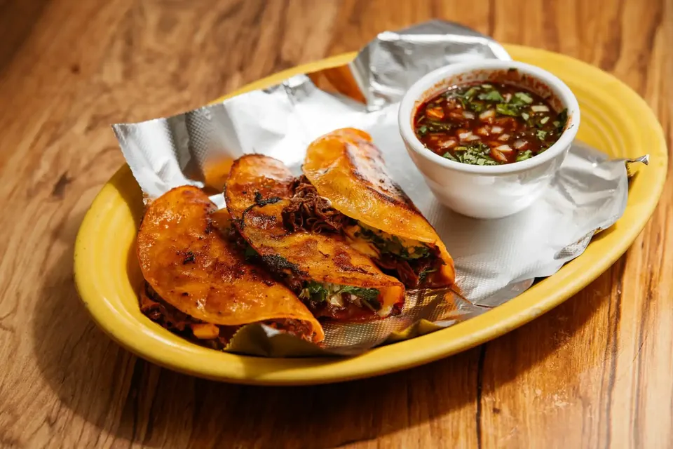 Our kitchen team preparing fresh dishes at El Loro Coon Rapids