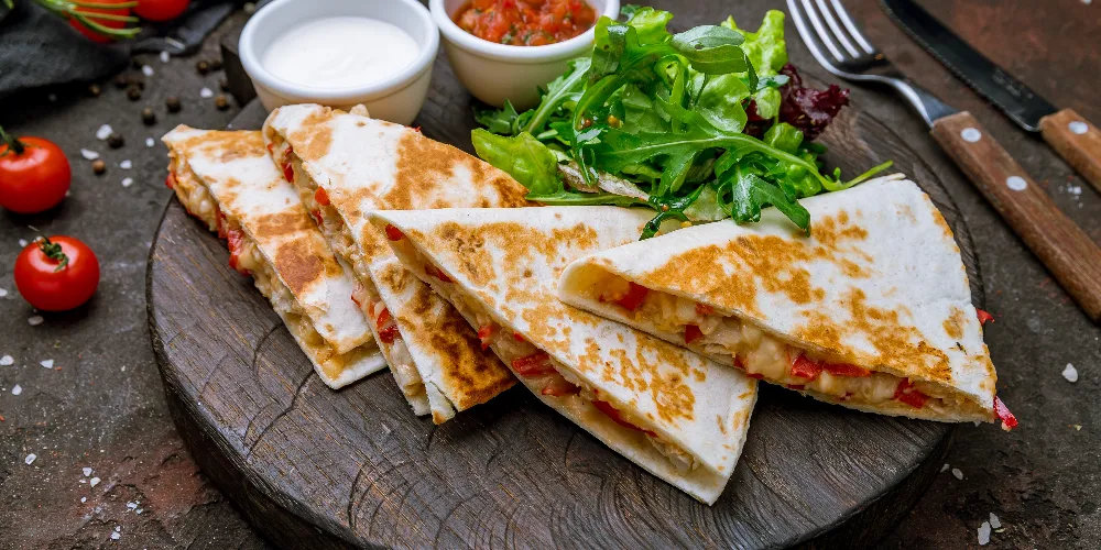 Banner Image of food served with doorstep delivery from a leading restaurant.3