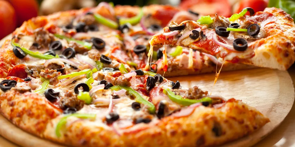 Banner Image of food offered by a reliable online food delivery restaurant.