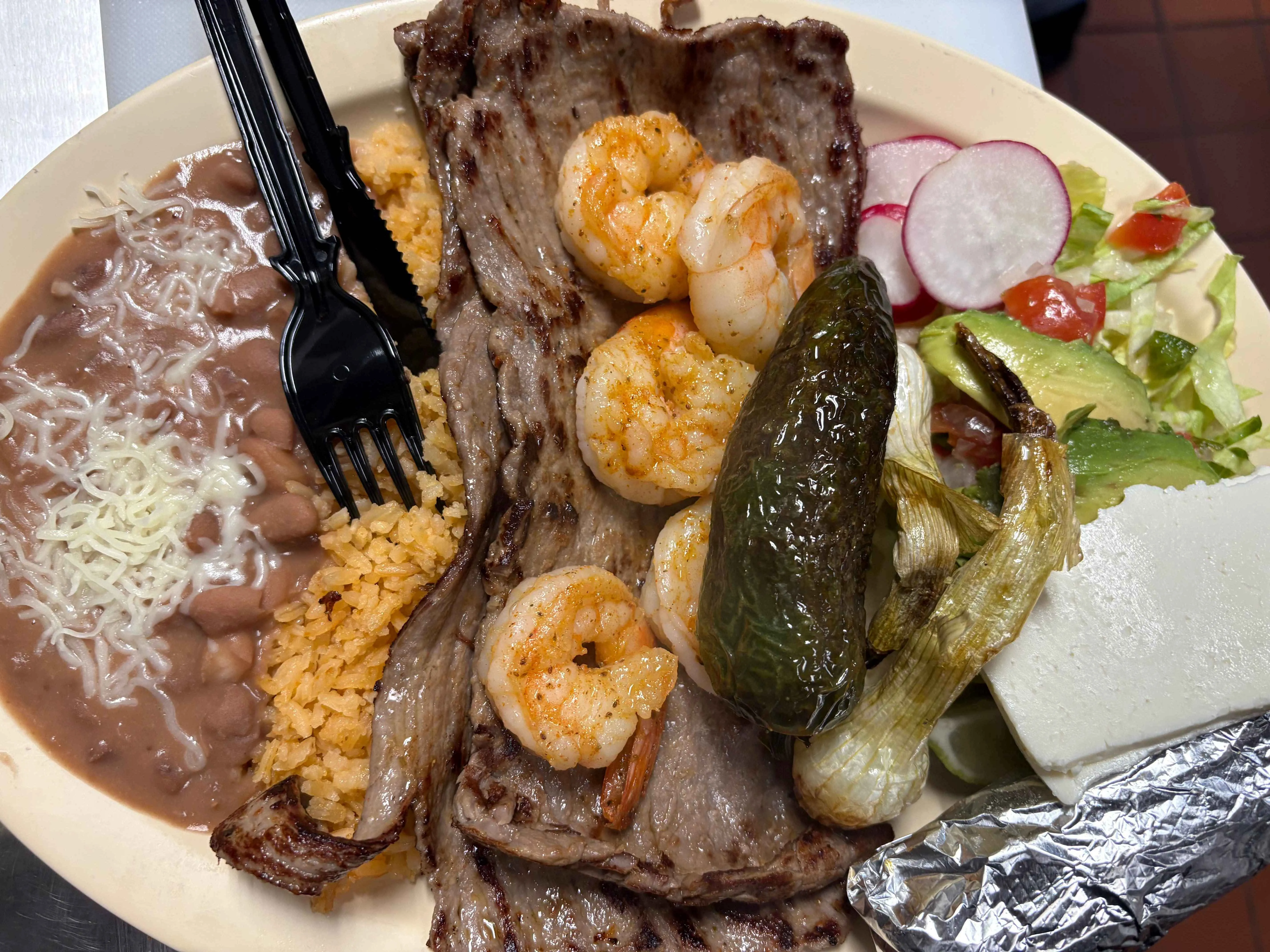 Banner Image of food from a popular restaurant delivering online.