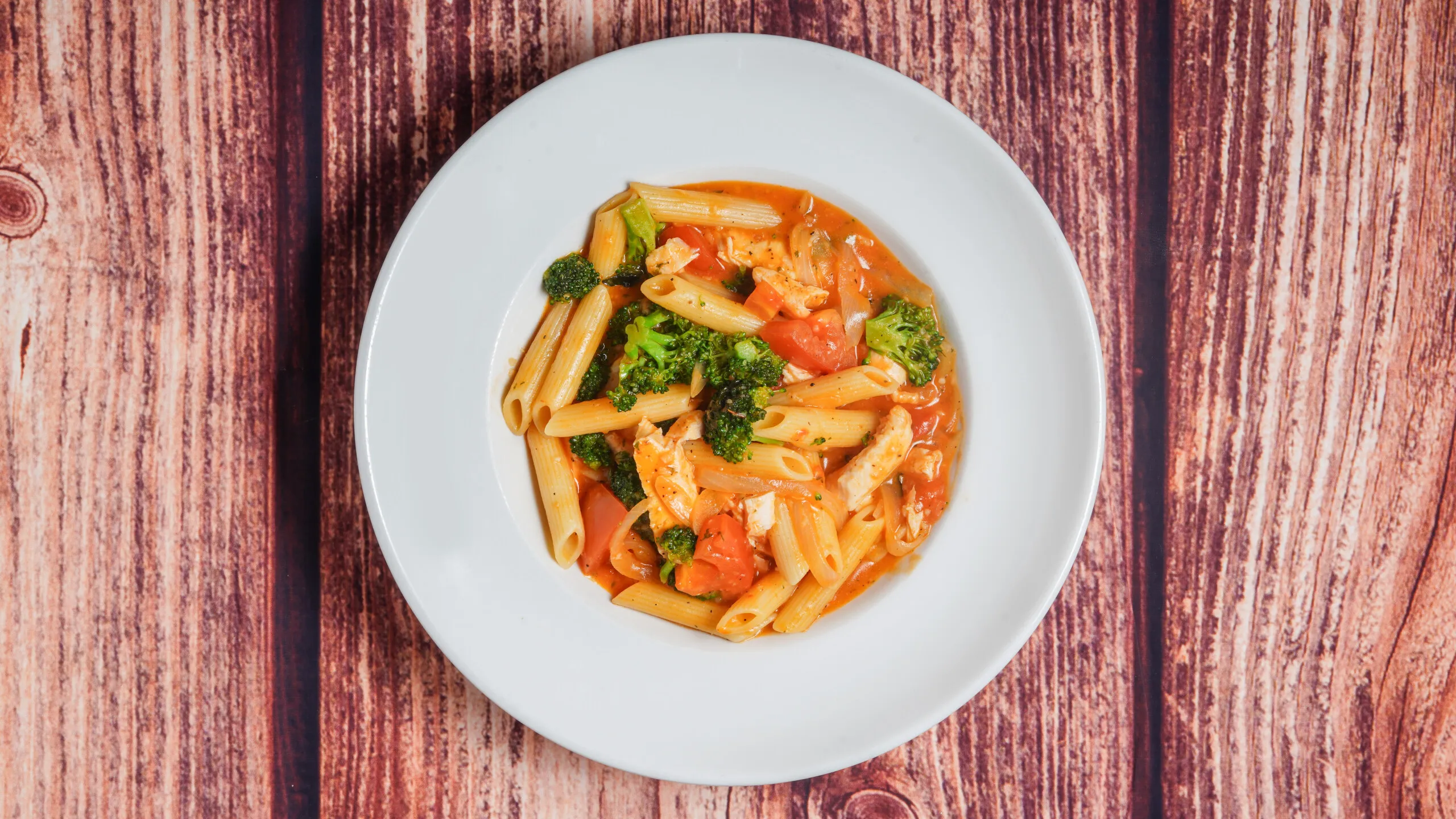 Banner Image of food prepared by a trusted restaurant for online ordering.