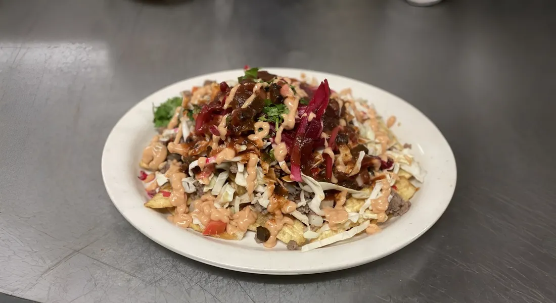 Banner Image of food from a popular restaurant delivering online.