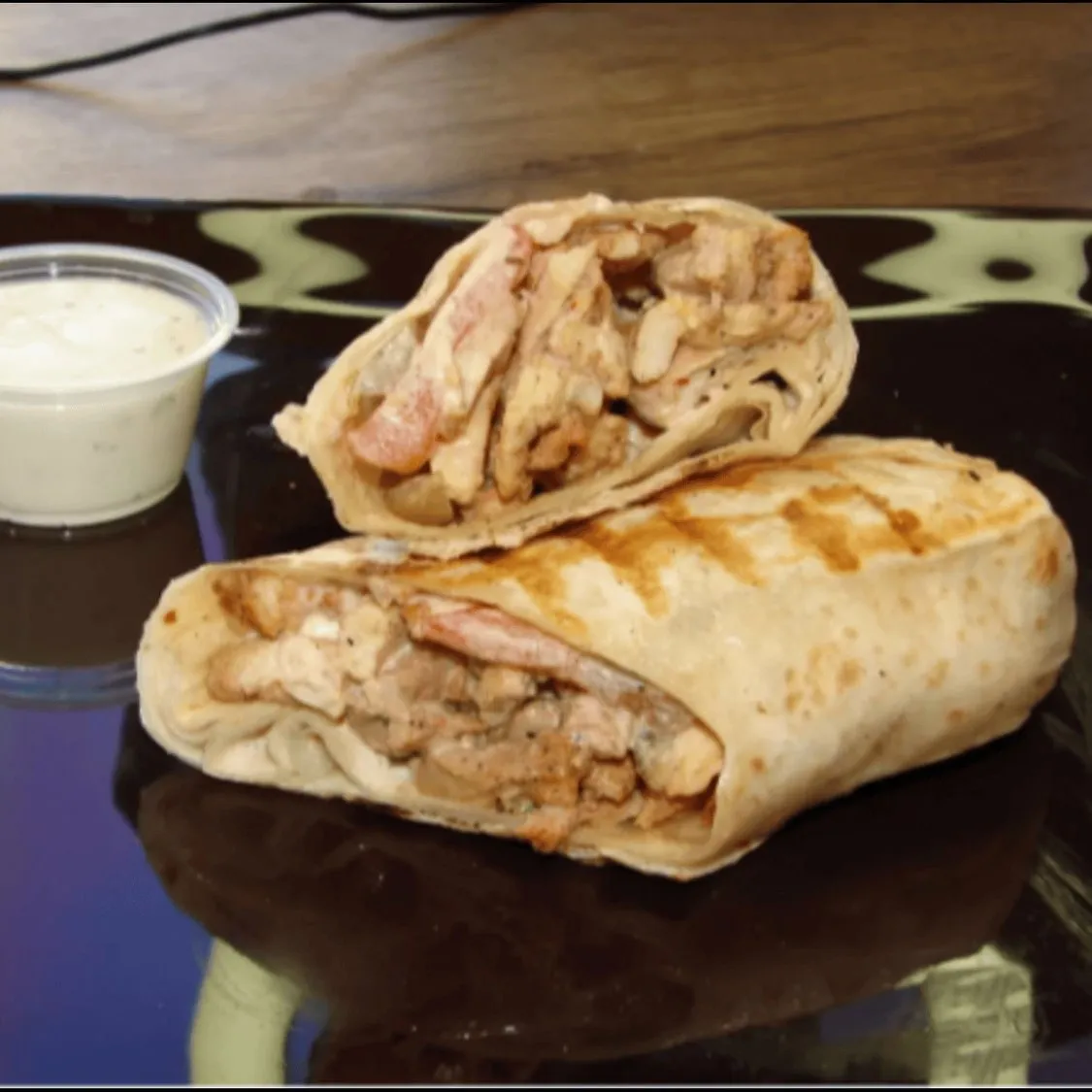 Plated Mediterranean,Middle Eastern,Sandwiches,Wraps food - Trusted local Mediterranean,Middle Eastern,Sandwiches,Wraps dining at Cairo's Gyros Tempe.